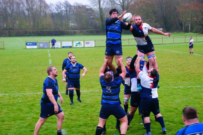 Daragh McLoughlin, right, competes at the line-out for Bridport 			         Picture: STUART BRIGGS