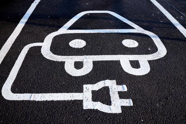 Bridport and Lyme Regis News: Signage for an electric car charging point (PA)