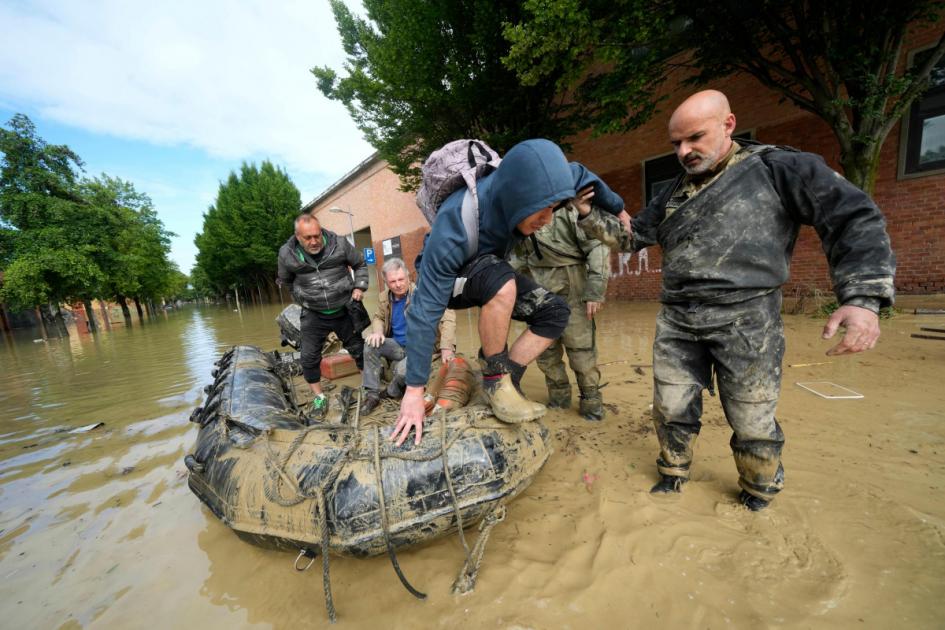 Crews work to reach Italian towns isolated by floods as clean up begins
