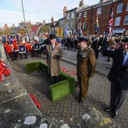 Residents, servicemen, veterans and councillors turn out in large numbers at Bridport in Dorset to pay their respects on Remembrance Sunday at the war memorial outside St Mary’s Church in South Street. 14th November 2021.  Picture Credit: Graham