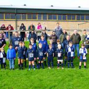 Bridport youth players observe a two-minute silence on Remembrance Sunday.  Picture: STUART BRIGGS