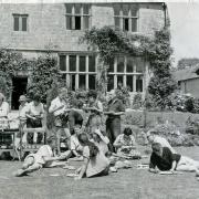 Members enjoying a lunch on the lawn in the early days of the Pilsdon Community, Picture: The Pilsdon Community