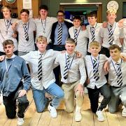 Bridport under-16s and 17s with coach Jesse Johnson, centre