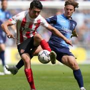 Wycombe Wanderers’ Dom Gape battles for the ball against Sunderland 	                Picture: TIM GOODE/PA WIRE