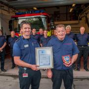 Assistant Chief Fire Officer Andy Cole (left) alongside retiring firefighter Peter Sartin. Picture: DWFRS
