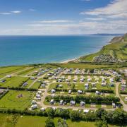 More than £100,000 has been raised to help preserve and educate people about the Jurassic Coast. Highlands End Holiday Park in Eype.