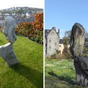 Two of Adrian Gray's works displayed in people's gardens