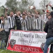 South Petherton Reserves celebrate with the trophy