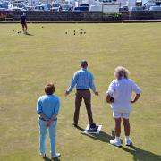 A member of the public anticipates the thrill of hitting the jack for the first time at Lyme Regis's Big Bowls Weekend