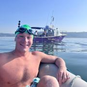 Harry Nelson swam 24 miles across the Channel to raise money for charity