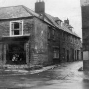 Oxenbury tailor's shop at the corner of Folly Mill Lane and South Street Picture: Bridport Museum Trust