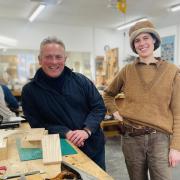 Escape to the Country presenter Jules Hudson with his Boat Building Academy furniture tutor Poppy Booth.