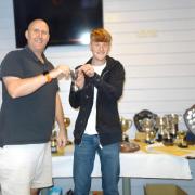 Dave Chidzoy, left, and Aaron Chambers collecting the Presidents Cup on behalf of The Angling Centre West Bay