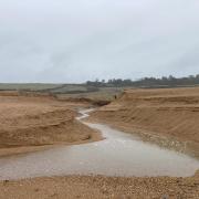 Large channel opens on Chesil Beach