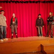 Jacob, Tallulah, Sherwin and Iris performing in a production of the 'We Will Rock You' musical in Bridport
