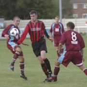 Gordon Childs, second left, has been appointed Beaminster manager for a second time. Childs is pictured in action for Bridport in 2005