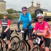 Finishers at West Bay on Coast to Coast Cycle Challenge