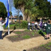 CEREMONY: Children from Bridport Primary School jpined councillors, dtaff and memebrs of the public for the ceremony