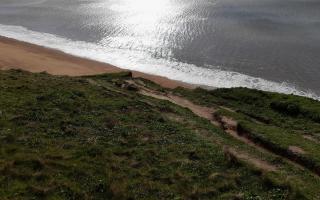 A crack has appeared on the path between Freshwater Holiday Park and West Bay