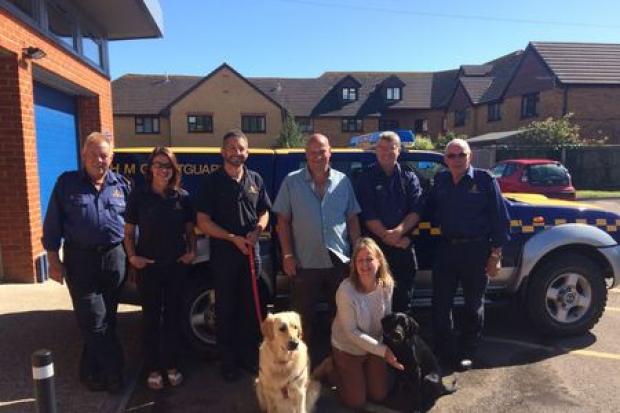 Couple thank Swanage Coastguard for rescuing their dog, Bella. Picture: Swanage Coastguard.